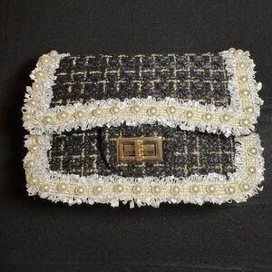 Black with pearl trimmimg